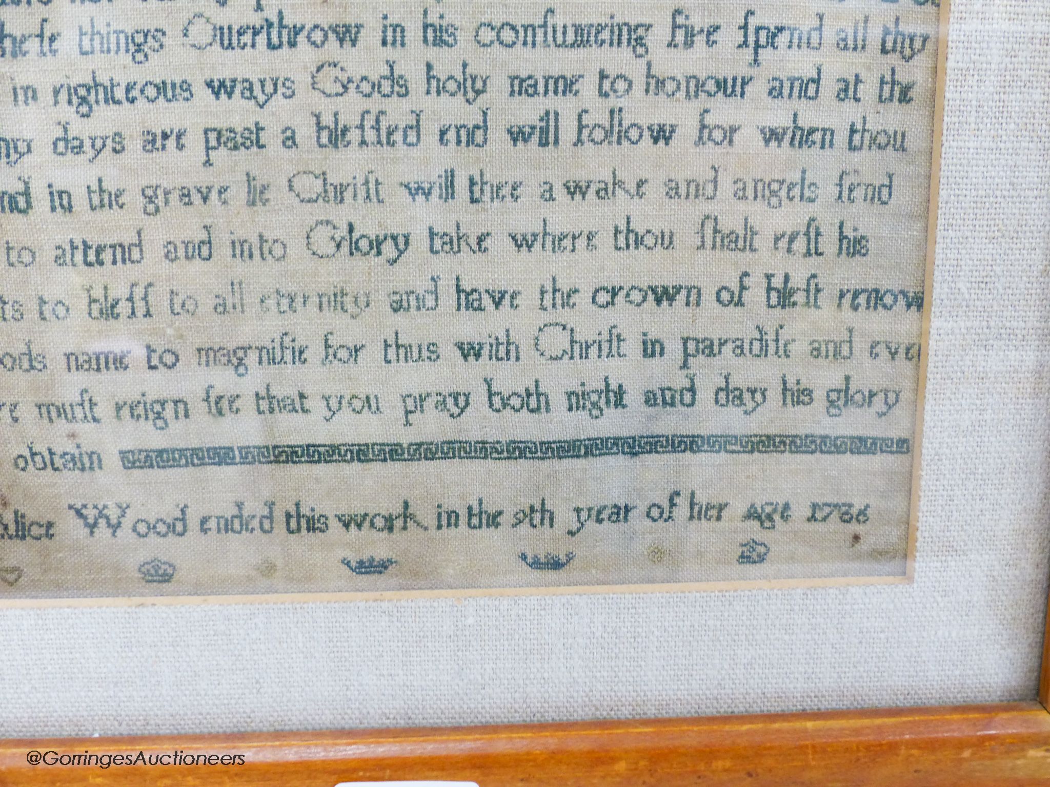 A George II needlework sampler, worked with the Lord's Prayer and religious text, by Alice Wood, dated 1736, 40 x 20cm